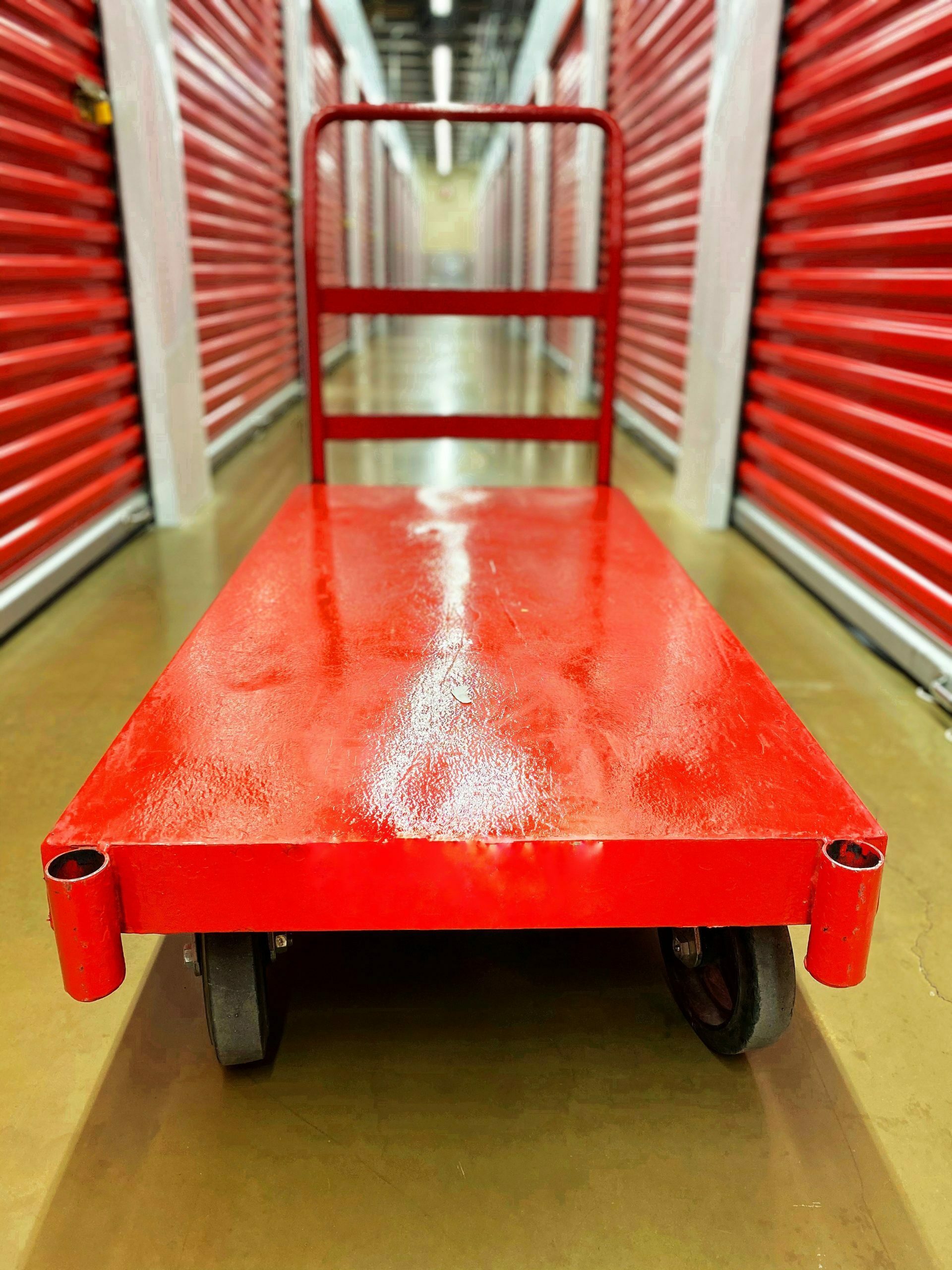 a red rectangular object on a red surface