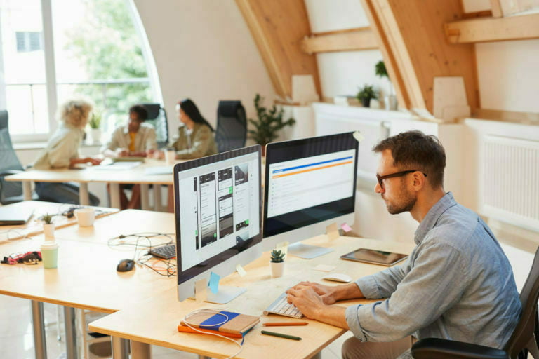 Men on a Desk