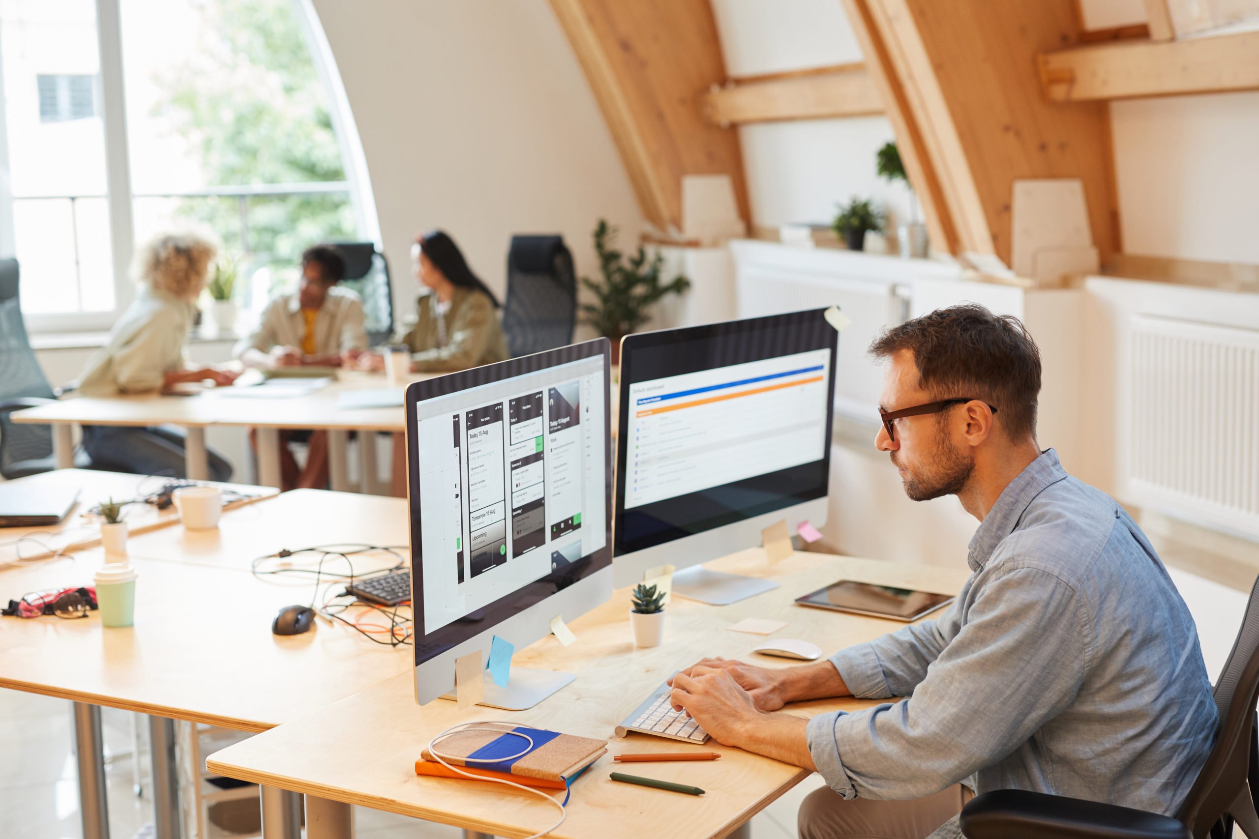 Men on a Desk