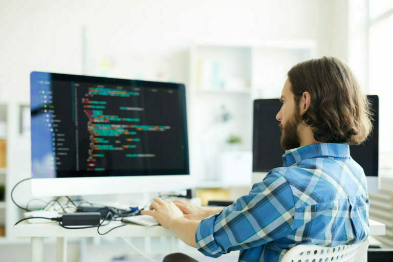 Coder creating computer software